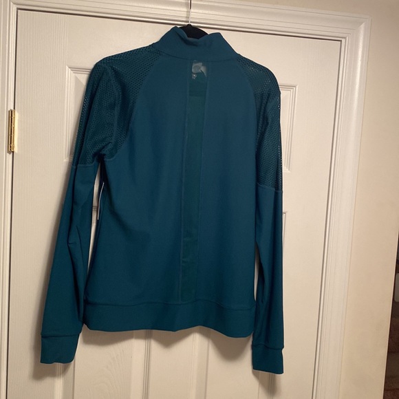 Brand New Xersion Deepest Teal Ventilation Jacket…size L - Picture 2 of 4